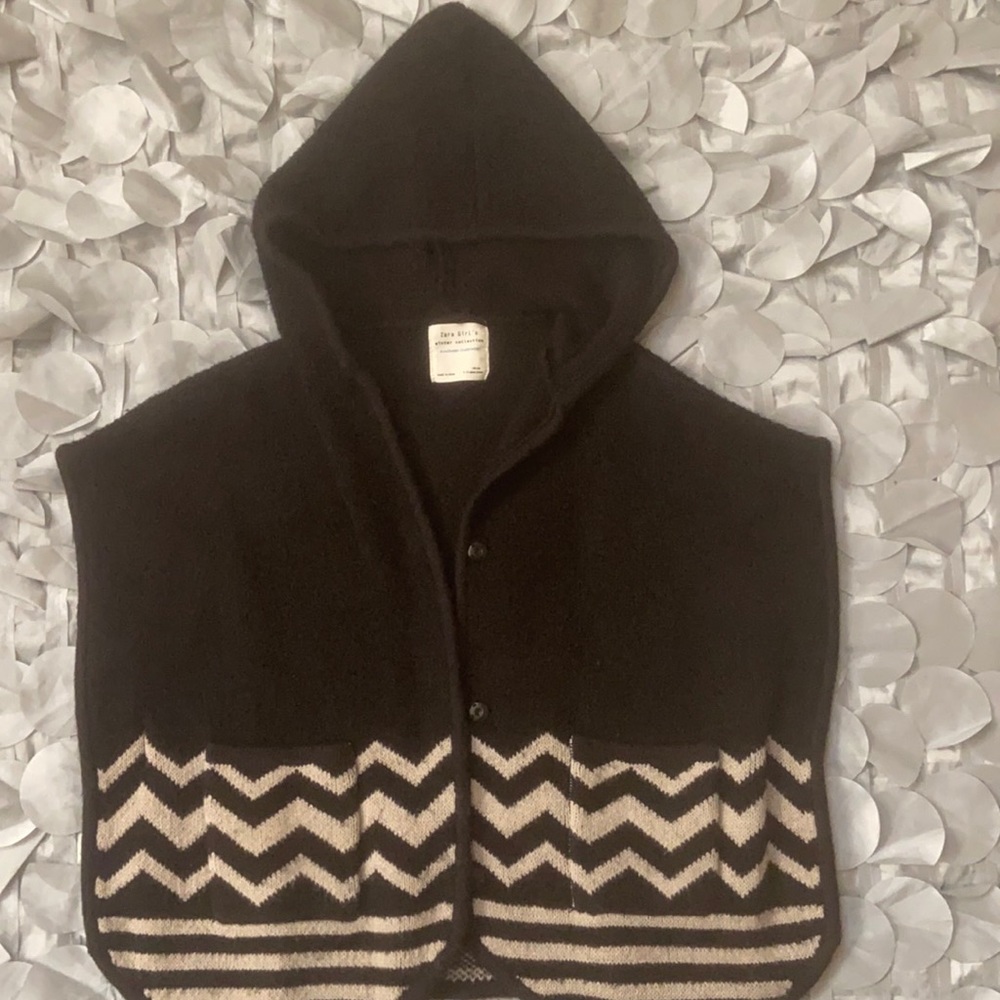 Adorable knitted poncho sweater for girls.